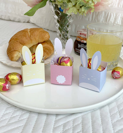 This printable box features a delightful Easter bunny design. It's the perfect size for holding small treats or goodies, making it a great option for Easter egg hunts, Easter baskets, or even just as a cute decoration on your Easter table.