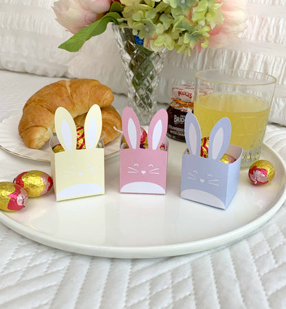 This printable box features a delightful Easter bunny design. It's the perfect size for holding small treats or goodies, making it a great option for Easter egg hunts, Easter baskets, or even just as a cute decoration on your Easter table.